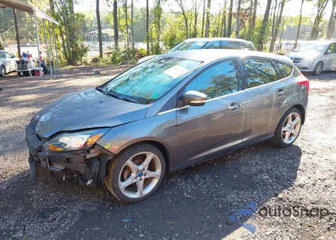 2012 Ford Focus Titanium z USA, uszkodzony, nr VIN 1FAHP3N22CL213454
